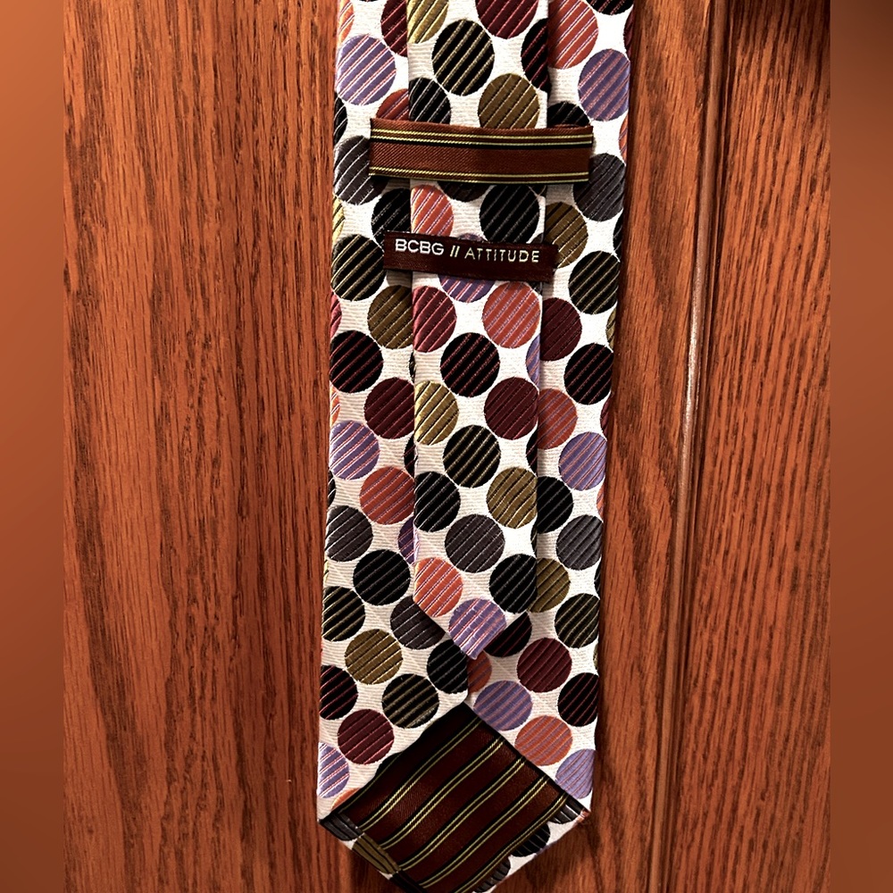 BCBG multi colored polkadotted tie 100% silk, hand sown